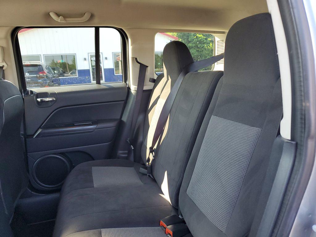 2015 Billet Silver Metallic Clearcoat /Dark Slate Gray Jeep Patriot Sport 4WD (1C4NJRBB4FD) with an 2.4L L4 DOHC 16V engine, 6-speed automatic transmission, located at 6064 Gull Rd, Kalamazoo, MI, 49048, (269) 222-0088, 42.328388, -85.512924 - Discover the reliability and rugged capability of the 2015 Jeep Patriot Sport, a compact SUV designed to tackle both urban and off-road adventures with ease. Equipped with a robust 4WD system, this vehicle ensures confident handling in diverse road conditions, making it an ideal choice for those who - Photo#7