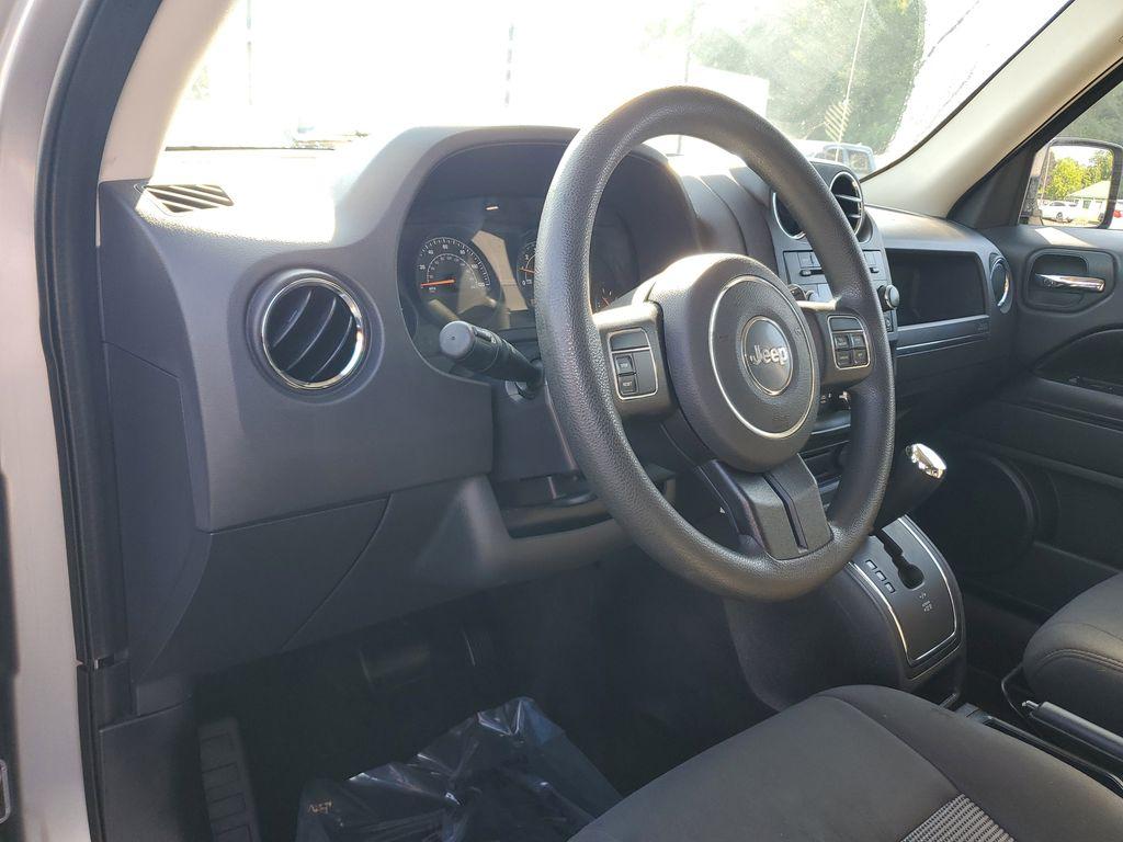 2015 Billet Silver Metallic Clearcoat /Dark Slate Gray Jeep Patriot Sport 4WD (1C4NJRBB4FD) with an 2.4L L4 DOHC 16V engine, 6-speed automatic transmission, located at 6064 Gull Rd, Kalamazoo, MI, 49048, (269) 222-0088, 42.328388, -85.512924 - Discover the reliability and rugged capability of the 2015 Jeep Patriot Sport, a compact SUV designed to tackle both urban and off-road adventures with ease. Equipped with a robust 4WD system, this vehicle ensures confident handling in diverse road conditions, making it an ideal choice for those who - Photo#12