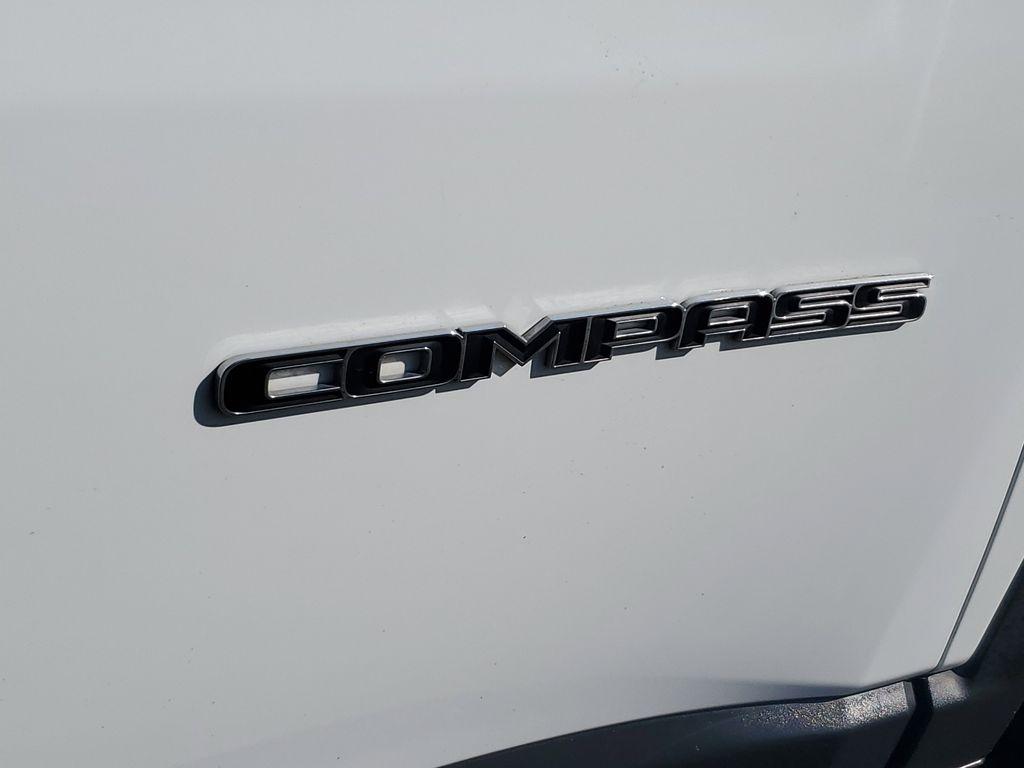 2023 Bright White Clearcoat /BLACK Jeep Compass Latitude (3C4NJDBNXPT) with an 2.0L L4 DOHC 16V TURBO engine, 8-speed automatic transmission, located at 6064 Gull Rd, Kalamazoo, MI, 49048, (269) 222-0088, 42.328388, -85.512924 - Experience the perfect blend of style, performance, and technology with this pre-owned 2023 Jeep Compass Latitude. Equipped with a robust 4-cylinder, 2.0L engine and advanced 4WD capabilities, this vehicle is ready to tackle both city streets and off-road adventures with confidence. The Jeep Compass - Photo#6