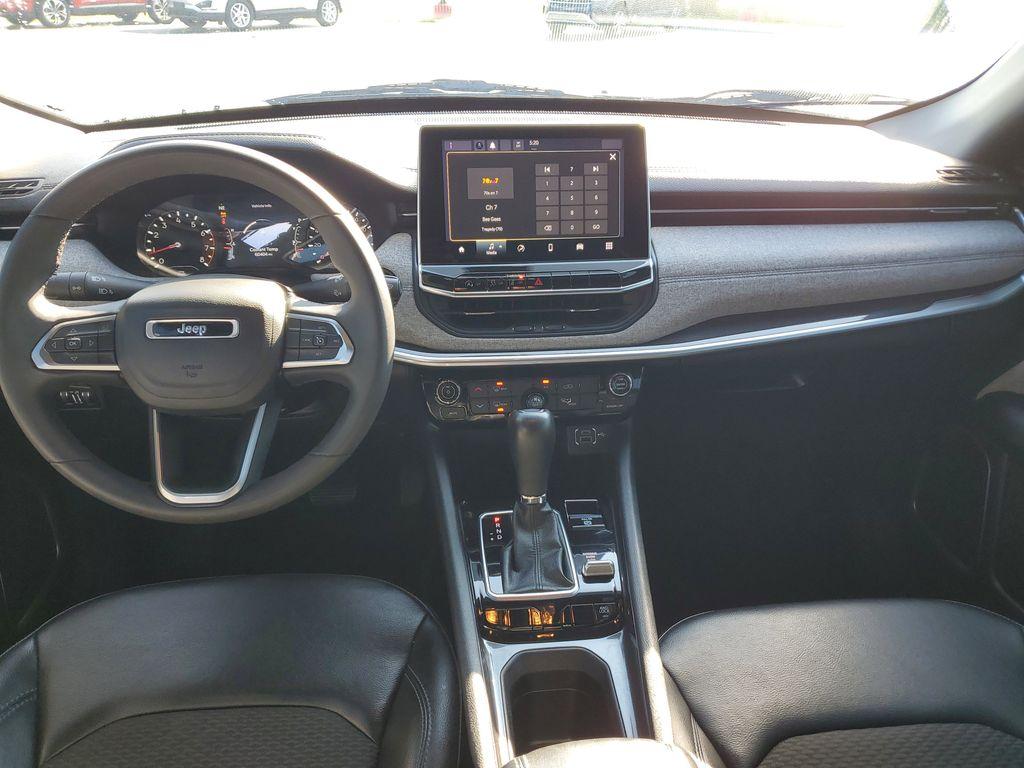 2023 Bright White Clearcoat /BLACK Jeep Compass Latitude (3C4NJDBNXPT) with an 2.0L L4 DOHC 16V TURBO engine, 8-speed automatic transmission, located at 6064 Gull Rd, Kalamazoo, MI, 49048, (269) 222-0088, 42.328388, -85.512924 - Experience the perfect blend of style, performance, and technology with this pre-owned 2023 Jeep Compass Latitude. Equipped with a robust 4-cylinder, 2.0L engine and advanced 4WD capabilities, this vehicle is ready to tackle both city streets and off-road adventures with confidence. The Jeep Compass - Photo#10