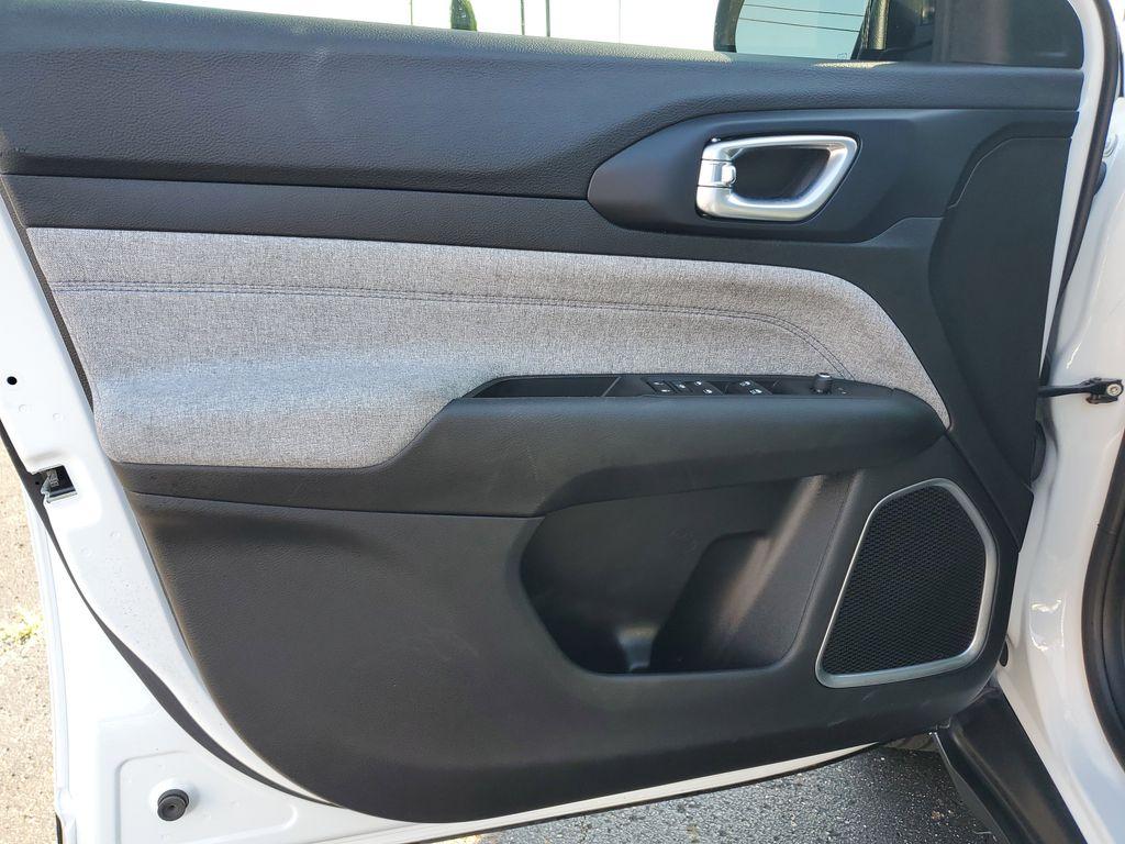2023 Bright White Clearcoat /BLACK Jeep Compass Latitude (3C4NJDBNXPT) with an 2.0L L4 DOHC 16V TURBO engine, 8-speed automatic transmission, located at 6064 Gull Rd, Kalamazoo, MI, 49048, (269) 222-0088, 42.328388, -85.512924 - Experience the perfect blend of style, performance, and technology with this pre-owned 2023 Jeep Compass Latitude. Equipped with a robust 4-cylinder, 2.0L engine and advanced 4WD capabilities, this vehicle is ready to tackle both city streets and off-road adventures with confidence. The Jeep Compass - Photo#12