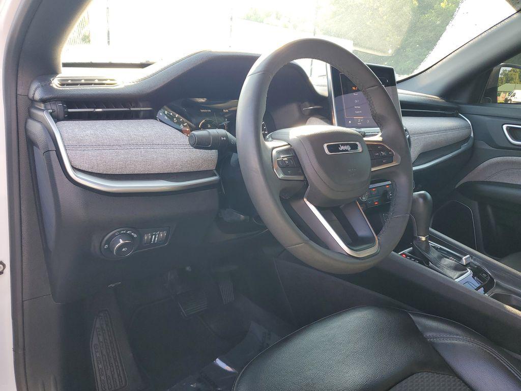 2023 Bright White Clearcoat /BLACK Jeep Compass Latitude (3C4NJDBNXPT) with an 2.0L L4 DOHC 16V TURBO engine, 8-speed automatic transmission, located at 6064 Gull Rd, Kalamazoo, MI, 49048, (269) 222-0088, 42.328388, -85.512924 - Experience the perfect blend of style, performance, and technology with this pre-owned 2023 Jeep Compass Latitude. Equipped with a robust 4-cylinder, 2.0L engine and advanced 4WD capabilities, this vehicle is ready to tackle both city streets and off-road adventures with confidence. The Jeep Compass - Photo#15