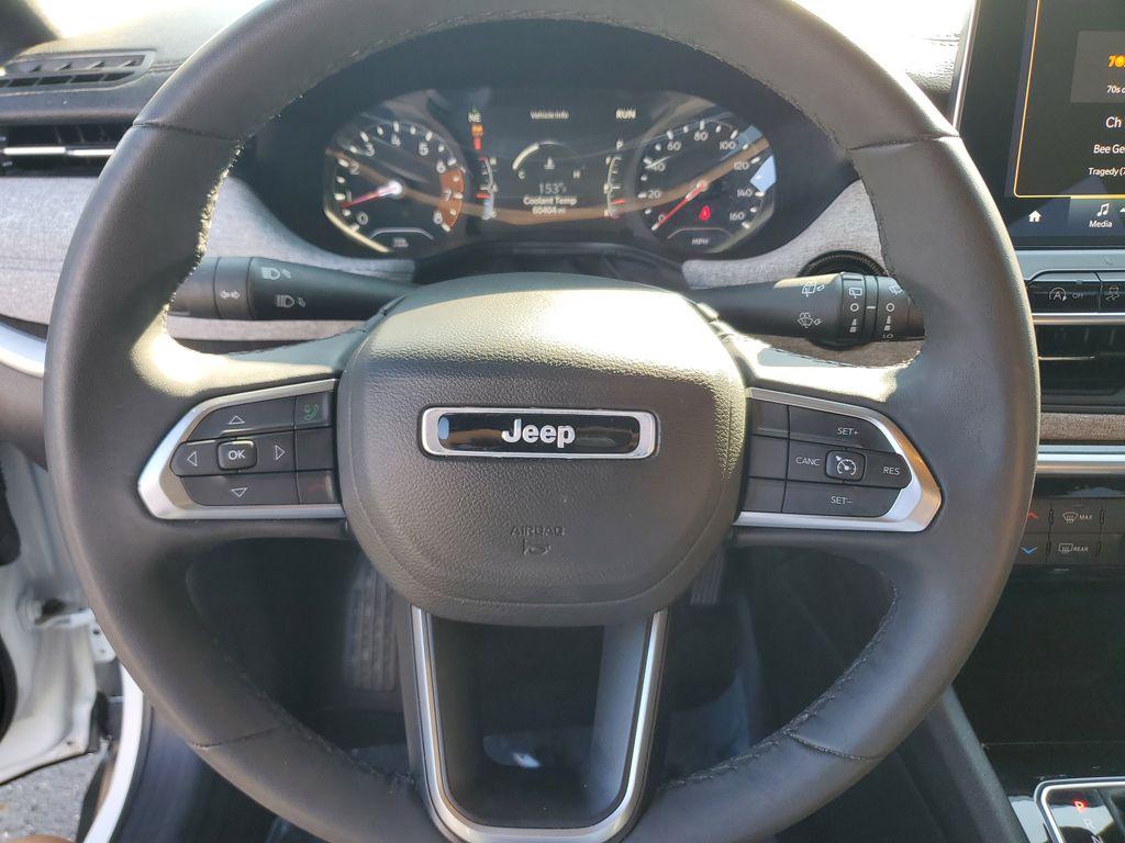 2023 Bright White Clearcoat /BLACK Jeep Compass Latitude (3C4NJDBNXPT) with an 2.0L L4 DOHC 16V TURBO engine, 8-speed automatic transmission, located at 6064 Gull Rd, Kalamazoo, MI, 49048, (269) 222-0088, 42.328388, -85.512924 - Experience the perfect blend of style, performance, and technology with this pre-owned 2023 Jeep Compass Latitude. Equipped with a robust 4-cylinder, 2.0L engine and advanced 4WD capabilities, this vehicle is ready to tackle both city streets and off-road adventures with confidence. The Jeep Compass - Photo#17