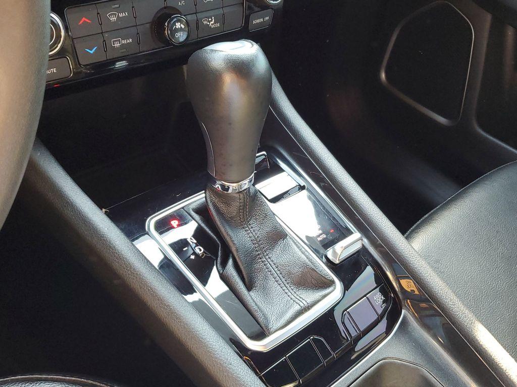 2023 Bright White Clearcoat /BLACK Jeep Compass Latitude (3C4NJDBNXPT) with an 2.0L L4 DOHC 16V TURBO engine, 8-speed automatic transmission, located at 6064 Gull Rd, Kalamazoo, MI, 49048, (269) 222-0088, 42.328388, -85.512924 - Experience the perfect blend of style, performance, and technology with this pre-owned 2023 Jeep Compass Latitude. Equipped with a robust 4-cylinder, 2.0L engine and advanced 4WD capabilities, this vehicle is ready to tackle both city streets and off-road adventures with confidence. The Jeep Compass - Photo#24