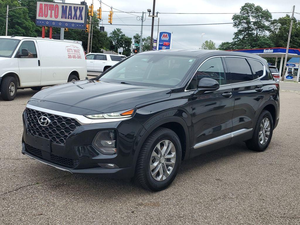 2020 Twilight Black /Espresso/Gray Hyundai Santa Fe SEL 2.4 AWD (5NMS3CAD3LH) with an 2.4L L4 DOHC 16V engine, 8A transmission, located at 234 Columbia Ave, Battle Creek, MI, 49015, (269) 222-0088, 42.298264, -85.192543 - <b>Vehicle Details</b><br>Looking for a reliable SUV that combines comfort, technology, and performance? Discover the 2020 Hyundai Santa Fe SEL with 4WD, now available for sale. This versatile vehicle, with a 4-cylinder, 2.4L engine, delivers an impressive balance of power and efficiency, making it - Photo#3