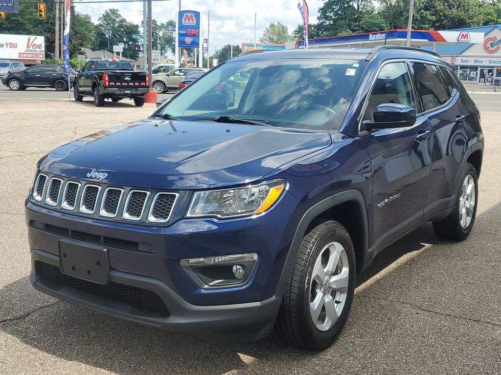 2018 Jazz Blue Pearlcoat /Black Jeep Compass Sport 4WD (3C4NJDBB4JT) with an 2.4L L4 DOHC 16V engine, 9-speed automatic transmission, located at 234 Columbia Ave, Battle Creek, MI, 49015, (269) 222-0088, 42.298264, -85.192543 - <b>Vehicle Details</b><br>Discover the perfect blend of style, performance, and versatility with this stunning 2018 Jeep Compass Latitude! This remarkable SUV is ready to take you on adventures both on and off the beaten path. Equipped with a robust 4WD system, it promises to deliver a confident and - Photo#1