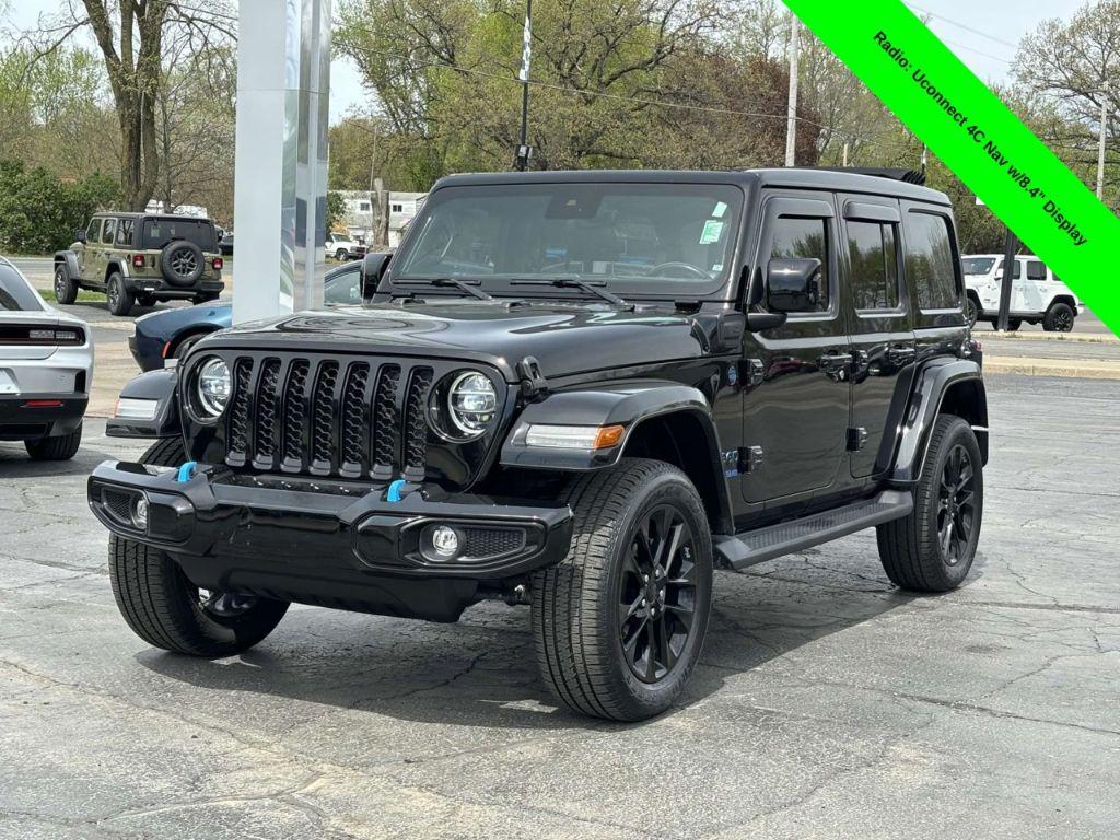 2021 Black Clearcoat /Black Jeep Wrangler Unlimited Sahara 4XE (1C4JJXP61MW) with an 2.0L L4 DOHC 16V HYBRID engine, 8A transmission, located at 6064 Gull Rd, Kalamazoo, MI, 49048, (269) 222-0088, 42.328388, -85.512924 - <b>Summary</b><br>Sky OneTouch PowerTop<br><br><b>Vehicle Details</b><br>Unleash your adventurous spirit with this stunning 2021 Jeep Wrangler Unlimited Sahara High Altitude! Built to conquer both city streets and rugged trails, this exceptional 4WD vehicle is equipped with a robust 4 Cyl, 2.0L engi - Photo#0