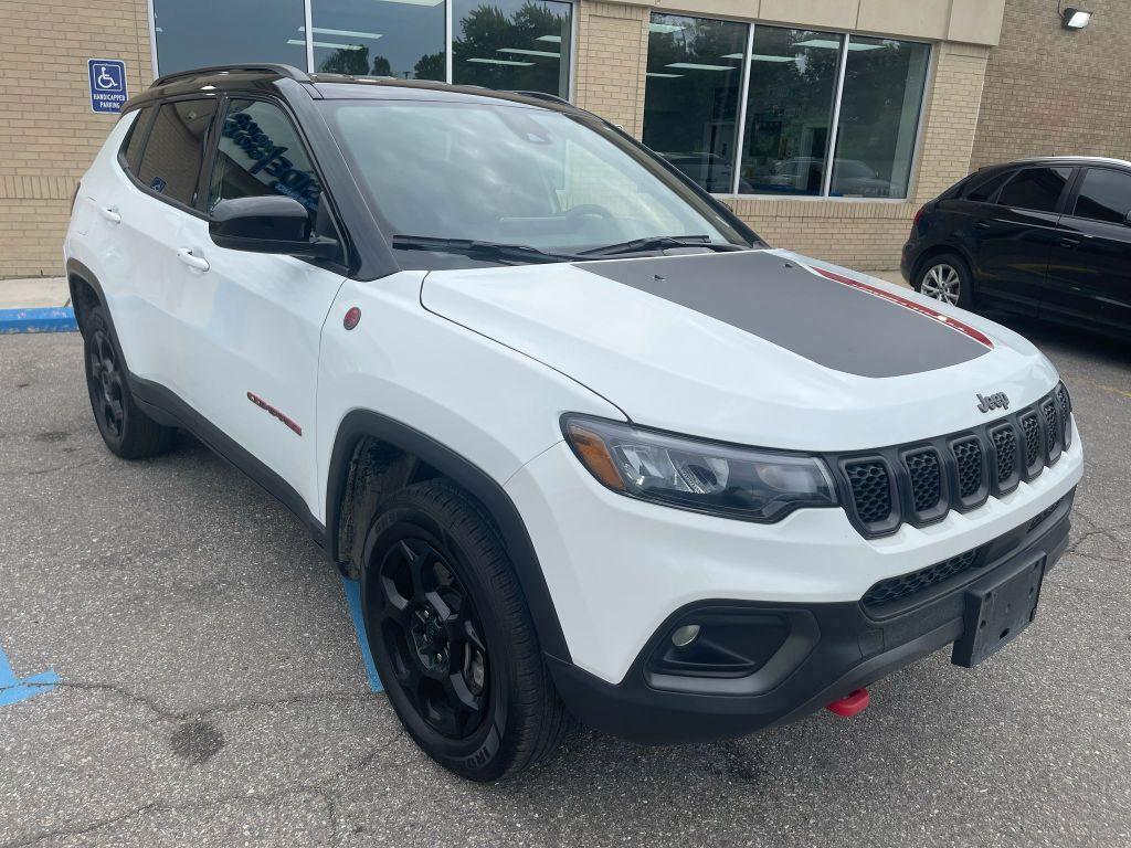 2023 Bright White Clearcoat /Ruby Red/Black Jeep Compass Trailhawk 4WD (3C4NJDDN5PT) with an 2.0L L4 DOHC 16V TURBO engine, 9A transmission, located at 6064 Gull Rd, Kalamazoo, MI, 49048, (269) 222-0088, 42.328388, -85.512924 - Discover adventure and reliability with this 2023 Jeep Compass Trailhawk, a robust companion for every journey. With its 4WD capability and efficient 4-cylinder, 2.0L engine, this vehicle is designed to deliver both power and fuel efficiency, making it a perfect fit for diverse terrains and long dri - Photo#0