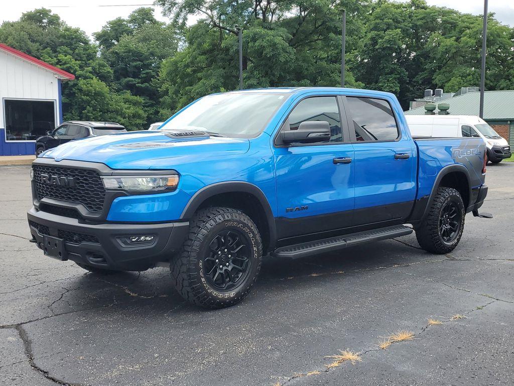 2025 Hydro Blue Pearlcoat /Red/Black RAM 1500 Rebel Crew Cab SB 4WD (1C6SRFLP8SN) with an 3.0L V6 DOHC 24V TURBO engine, 8A transmission, located at 6064 Gull Rd, Kalamazoo, MI, 49048, (269) 222-0088, 42.328388, -85.512924 - For sale: A lightly pre-owned 2025 Ram 1500 Rebel, ready to tackle any adventure with just 10,001 miles on the odometer. This powerful truck is equipped with a 6-cylinder, 3.0L engine and 4WD, offering you the performance and reliability you need both on and off the road.<br><br>Inside, you'll find - Photo#1