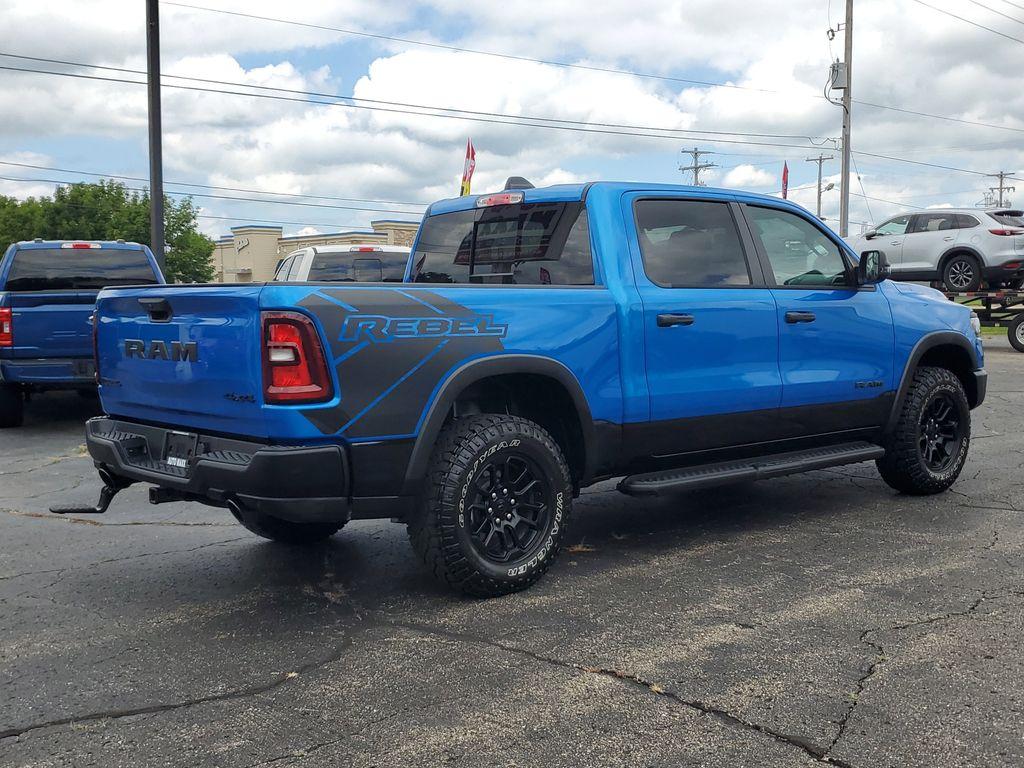 2025 Hydro Blue Pearlcoat /Red/Black RAM 1500 Rebel Crew Cab SB 4WD (1C6SRFLP8SN) with an 3.0L V6 DOHC 24V TURBO engine, 8A transmission, located at 6064 Gull Rd, Kalamazoo, MI, 49048, (269) 222-0088, 42.328388, -85.512924 - For sale: A lightly pre-owned 2025 Ram 1500 Rebel, ready to tackle any adventure with just 10,001 miles on the odometer. This powerful truck is equipped with a 6-cylinder, 3.0L engine and 4WD, offering you the performance and reliability you need both on and off the road.<br><br>Inside, you'll find - Photo#3