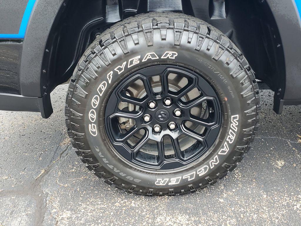 2025 Hydro Blue Pearlcoat /Red/Black RAM 1500 Rebel Crew Cab SB 4WD (1C6SRFLP8SN) with an 3.0L V6 DOHC 24V TURBO engine, 8A transmission, located at 6064 Gull Rd, Kalamazoo, MI, 49048, (269) 222-0088, 42.328388, -85.512924 - For sale: A lightly pre-owned 2025 Ram 1500 Rebel, ready to tackle any adventure with just 10,001 miles on the odometer. This powerful truck is equipped with a 6-cylinder, 3.0L engine and 4WD, offering you the performance and reliability you need both on and off the road.<br><br>Inside, you'll find - Photo#4