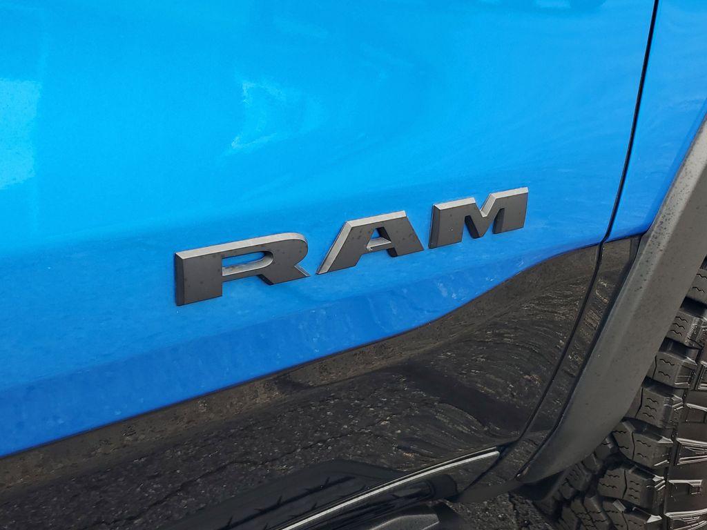 2025 Hydro Blue Pearlcoat /Red/Black RAM 1500 Rebel Crew Cab SB 4WD (1C6SRFLP8SN) with an 3.0L V6 DOHC 24V TURBO engine, 8A transmission, located at 6064 Gull Rd, Kalamazoo, MI, 49048, (269) 222-0088, 42.328388, -85.512924 - For sale: A lightly pre-owned 2025 Ram 1500 Rebel, ready to tackle any adventure with just 10,001 miles on the odometer. This powerful truck is equipped with a 6-cylinder, 3.0L engine and 4WD, offering you the performance and reliability you need both on and off the road.<br><br>Inside, you'll find - Photo#5