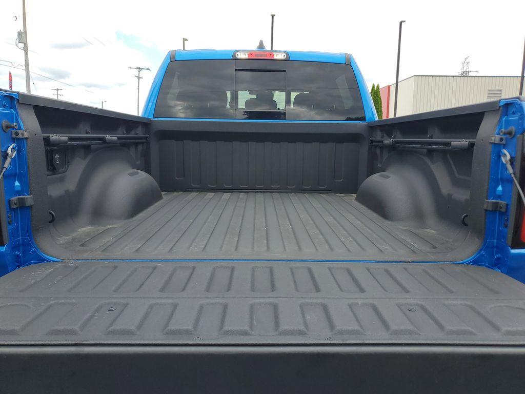 2025 Hydro Blue Pearlcoat /Red/Black RAM 1500 Rebel Crew Cab SB 4WD (1C6SRFLP8SN) with an 3.0L V6 DOHC 24V TURBO engine, 8A transmission, located at 6064 Gull Rd, Kalamazoo, MI, 49048, (269) 222-0088, 42.328388, -85.512924 - For sale: A lightly pre-owned 2025 Ram 1500 Rebel, ready to tackle any adventure with just 10,001 miles on the odometer. This powerful truck is equipped with a 6-cylinder, 3.0L engine and 4WD, offering you the performance and reliability you need both on and off the road.<br><br>Inside, you'll find - Photo#8