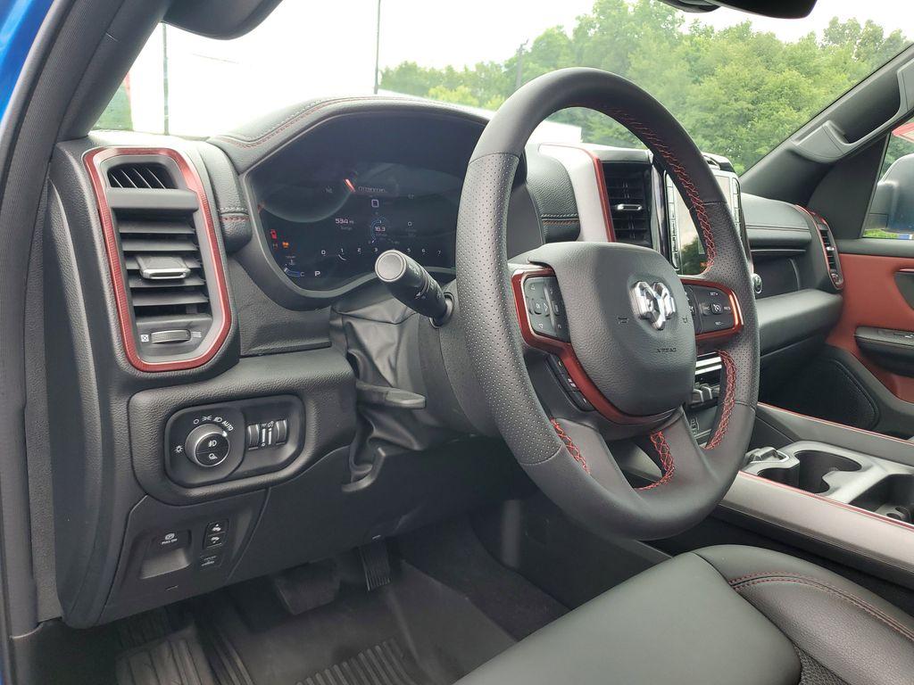 2025 Hydro Blue Pearlcoat /Red/Black RAM 1500 Rebel Crew Cab SB 4WD (1C6SRFLP8SN) with an 3.0L V6 DOHC 24V TURBO engine, 8A transmission, located at 6064 Gull Rd, Kalamazoo, MI, 49048, (269) 222-0088, 42.328388, -85.512924 - For sale: A lightly pre-owned 2025 Ram 1500 Rebel, ready to tackle any adventure with just 10,001 miles on the odometer. This powerful truck is equipped with a 6-cylinder, 3.0L engine and 4WD, offering you the performance and reliability you need both on and off the road.<br><br>Inside, you'll find - Photo#15