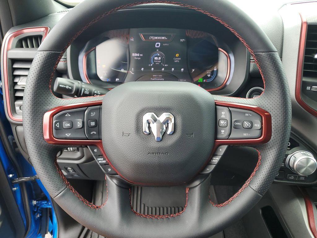 2025 Hydro Blue Pearlcoat /Red/Black RAM 1500 Rebel Crew Cab SB 4WD (1C6SRFLP8SN) with an 3.0L V6 DOHC 24V TURBO engine, 8A transmission, located at 6064 Gull Rd, Kalamazoo, MI, 49048, (269) 222-0088, 42.328388, -85.512924 - For sale: A lightly pre-owned 2025 Ram 1500 Rebel, ready to tackle any adventure with just 10,001 miles on the odometer. This powerful truck is equipped with a 6-cylinder, 3.0L engine and 4WD, offering you the performance and reliability you need both on and off the road.<br><br>Inside, you'll find - Photo#17