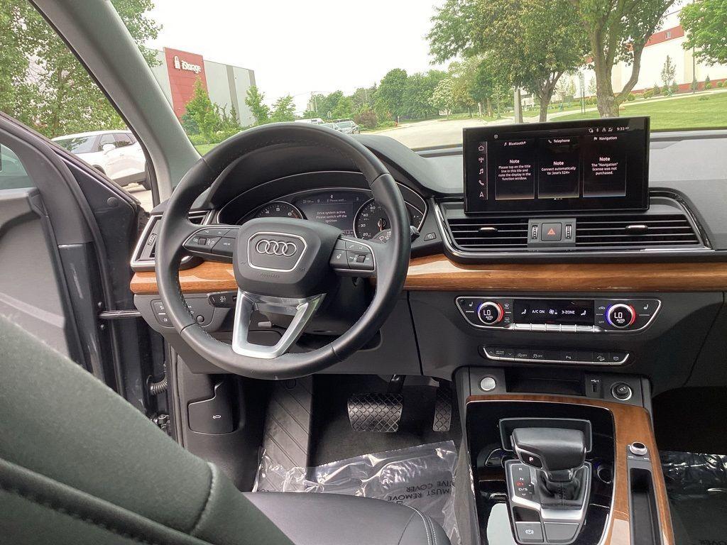 2023 Daytona Gray Pearl Effect /Black Audi Q5 2.0T Premium quattro (WA1GAAFY6P2) with an 2.0L L4 DOHC 16V engine, 7A transmission, located at 6064 Gull Rd, Kalamazoo, MI, 49048, (269) 222-0088, 42.328388, -85.512924 - <b>Summary</b><br>Power Moonroof<br><br><b>Vehicle Details</b><br>Experience the perfect blend of performance, luxury, and technology with this 2023 Audi Q5 S line Premium. This sophisticated SUV is equipped with Audi's renowned all-wheel drive system, ensuring exceptional handling and stability on - Photo#5