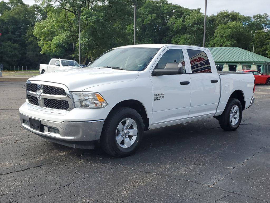 2023 Bright White Clearcoat /Diesel Gray/Black RAM 1500 Classic Tradesman Crew Cab SWB 4WD (1C6RR7LG0PS) with an 3.6L V6 DOHC 24V FFV engine, 8A transmission, located at 6064 Gull Rd, Kalamazoo, MI, 49048, (269) 222-0088, 42.328388, -85.512924 - Explore the robust capability and timeless design of the 2023 Ram 1500 Classic SLT, a remarkable addition to any fleet or personal collection. This vehicle, with its proven 4WD system, is equipped to tackle a variety of terrains with ease, making it an ideal choice for both work and leisure. Under t - Photo#1