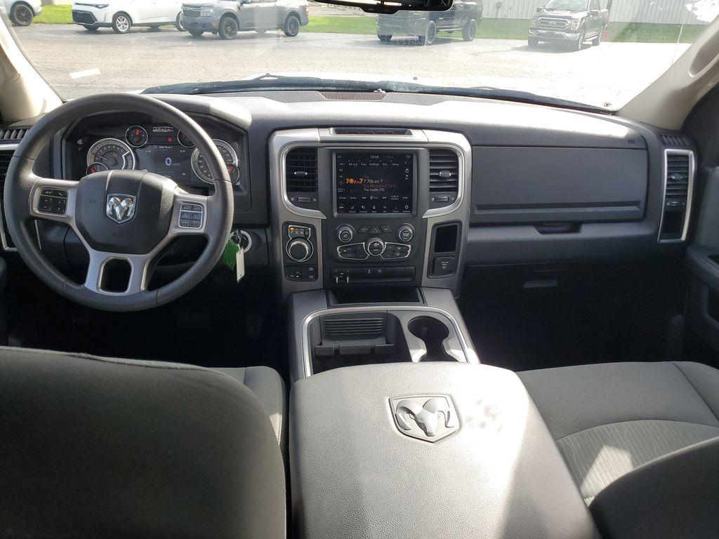 2023 Bright White Clearcoat /Diesel Gray/Black RAM 1500 Classic Tradesman Crew Cab SWB 4WD (1C6RR7LG0PS) with an 3.6L V6 DOHC 24V FFV engine, 8A transmission, located at 6064 Gull Rd, Kalamazoo, MI, 49048, (269) 222-0088, 42.328388, -85.512924 - Explore the robust capability and timeless design of the 2023 Ram 1500 Classic SLT, a remarkable addition to any fleet or personal collection. This vehicle, with its proven 4WD system, is equipped to tackle a variety of terrains with ease, making it an ideal choice for both work and leisure. Under t - Photo#8