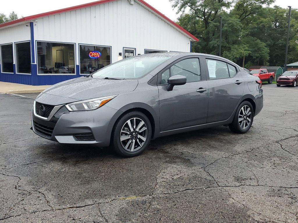 2021 Gun Metallic /Graphite Nissan Versa SV (3N1CN8EV9ML) with an 1.6L L4 DOHC 16V engine, CVT transmission, located at 6064 Gull Rd, Kalamazoo, MI, 49048, (269) 222-0088, 42.328388, -85.512924 - <b>Vehicle Details</b><br>Introducing the sleek and stylish 2021 Nissan Versa SV, now available at our esteemed dealership. This used gem boasts a low mileage of 41494 miles and is equipped with an efficient front-wheel drive system, ensuring a smooth and comfortable ride for both city commutes and - Photo #1