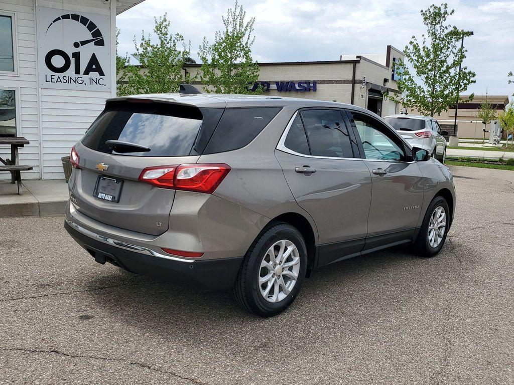 2018 Pepperdust Metallic /Jet Black Chevrolet Equinox LT 2WD (3GNAXJEV5JL) with an 1.5L L4 DIR DOHC 16V TURBO engine, 6A transmission, located at 234 Columbia Ave, Battle Creek, MI, 49015, (269) 222-0088, 42.298264, -85.192543 - <b>Vehicle Details</b><br>Are you in the market for a reliable and stylish SUV that won't break the bank? Look no further than this amazing 2018 Chevrolet Equinox LT! With only 97,306 miles on the odometer, this beauty still has plenty of life left in it. Equipped with a fuel-efficient L4, 1.5L eng - Photo #1