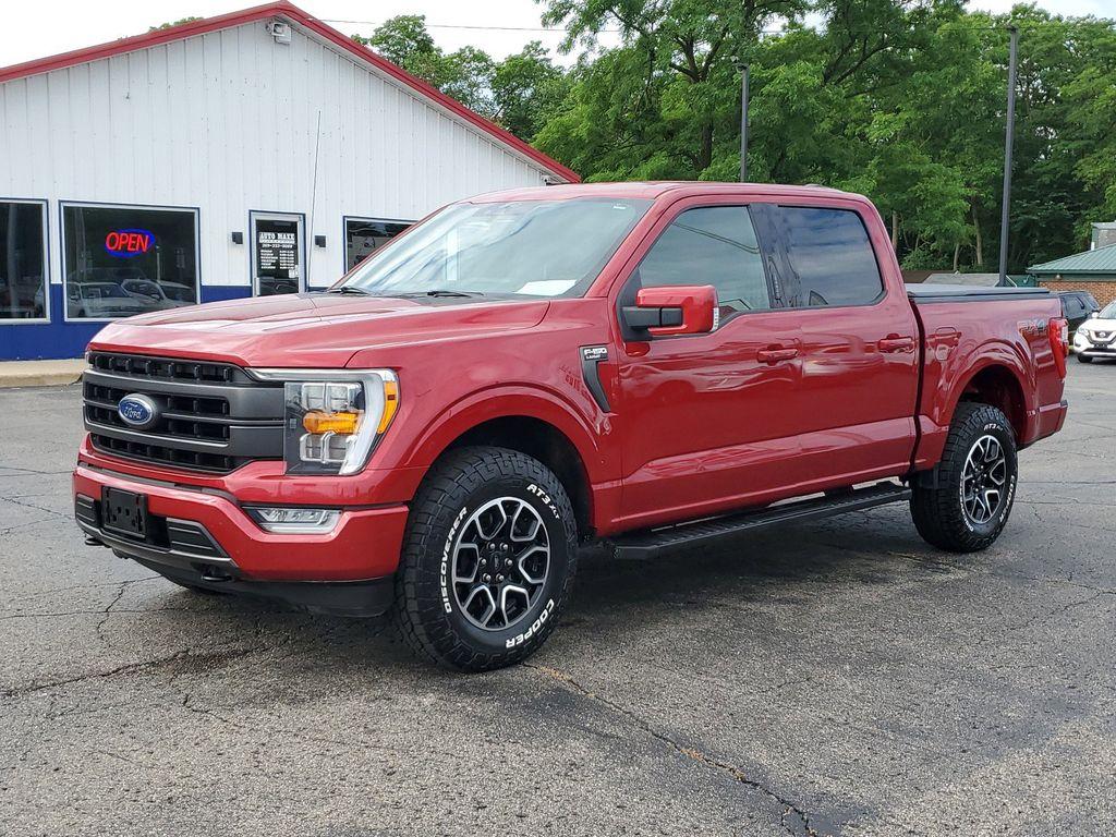 2021 Rapid Red Metallic Tinted Clearcoat /Black Ford F-150 Lariat SuperCrew 5.5-ft. Bed 4WD (1FTFW1E84MK) with an 4.6L V8 SOHC 24V engine, 10-speed automatic transmission, located at 6064 Gull Rd, Kalamazoo, MI, 49048, (269) 222-0088, 42.328388, -85.512924 - <b>Vehicle Details</b><br>Experience the perfect blend of power, luxury, and technology with this stunning pre-owned 2021 Ford F-150 LARIAT! This truck is built to impress, featuring a mighty V6, 3.5L engine that delivers robust performance whether you're on the highway or tackling rugged terrain. T - Photo#1