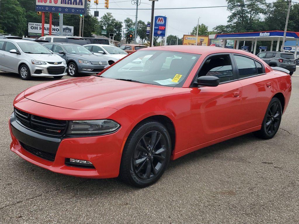 2020 Torred Clearcoat /Black Dodge Charger SXT AWD (2C3CDXJG7LH) with an 3.6L V6 DOHC 24V engine, 8A transmission, located at 234 Columbia Ave, Battle Creek, MI, 49015, (269) 222-0088, 42.298264, -85.192543 - <b>Vehicle Details</b><br>Looking for a dynamic blend of performance and comfort? Check out this 2020 Dodge Charger SXT, equipped with All-Wheel Drive and a powerful V6, 3.6L engine. This standout sedan balances thrilling acceleration with precise handling, making every drive an adventure. Inside, - Photo#3